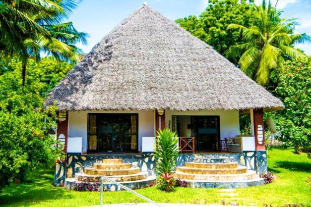 Oasis Diani Beach Villas Экстерьер фото